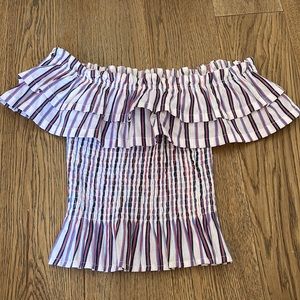 About Us red/blue/white shirt
